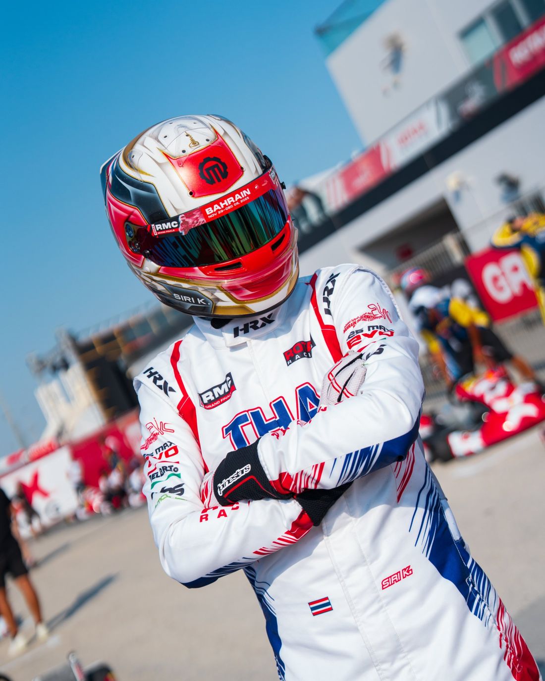 Team Thailand driver poses with arms crossed