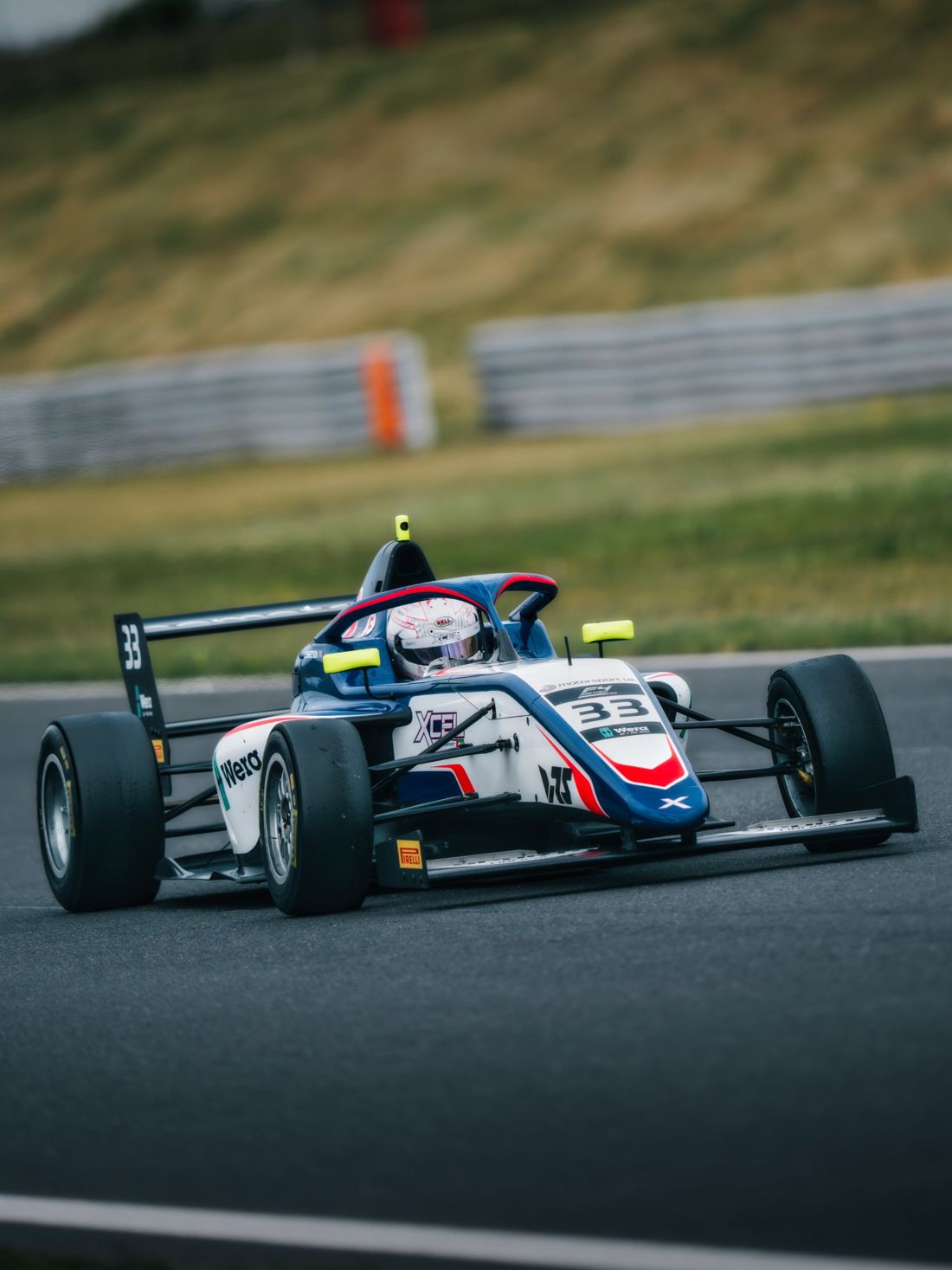 Xcel car number 33 on the racing line