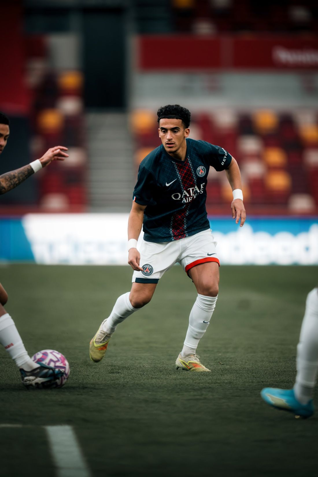 PSG player closes down the ball