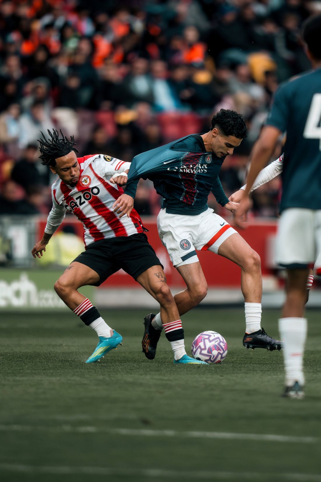 Tussle for possession in midfield